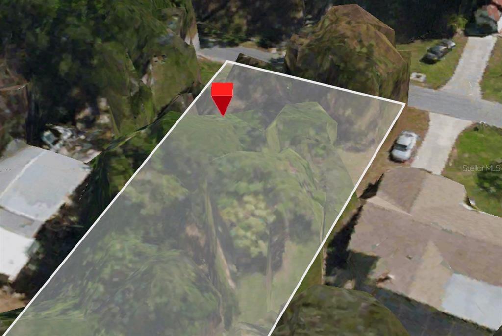 This is an aerial map view of a wooded lot with a red location marker — 516 PAMETO ROAD, NOKOMIS, FL