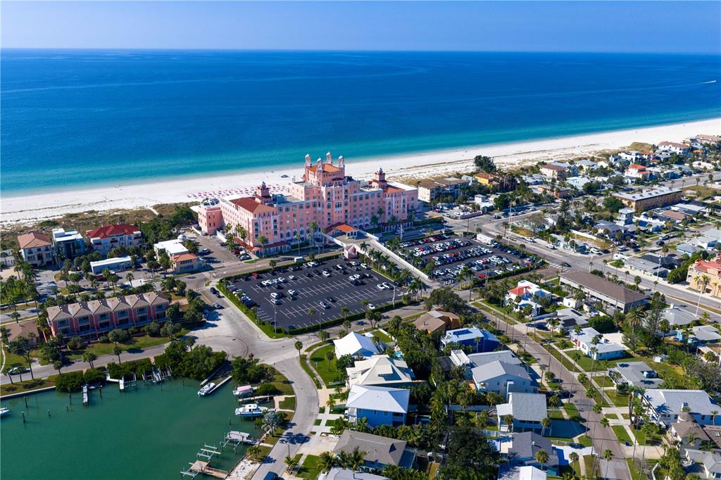 An aerial view of the pink Don CeSar hotel situated on a sandy beach — 3614 GULF BOULEVARD, ST PETE BEACH, FL