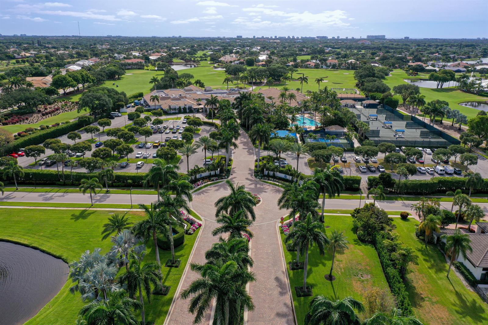 An aerial view shows a country club with a large parking lot and tennis courts — 4961 Bocaire Boulevard, Boca Raton FL 33487, BOCA RATON, FL