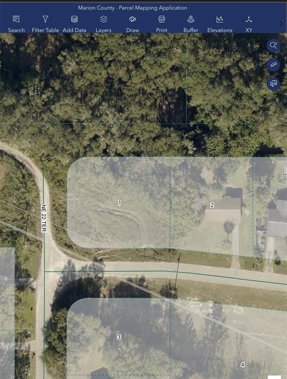 This is a satellite map showing four numbered land parcels located along a paved road — 0000 NE 55TH STREET, OCALA, FL