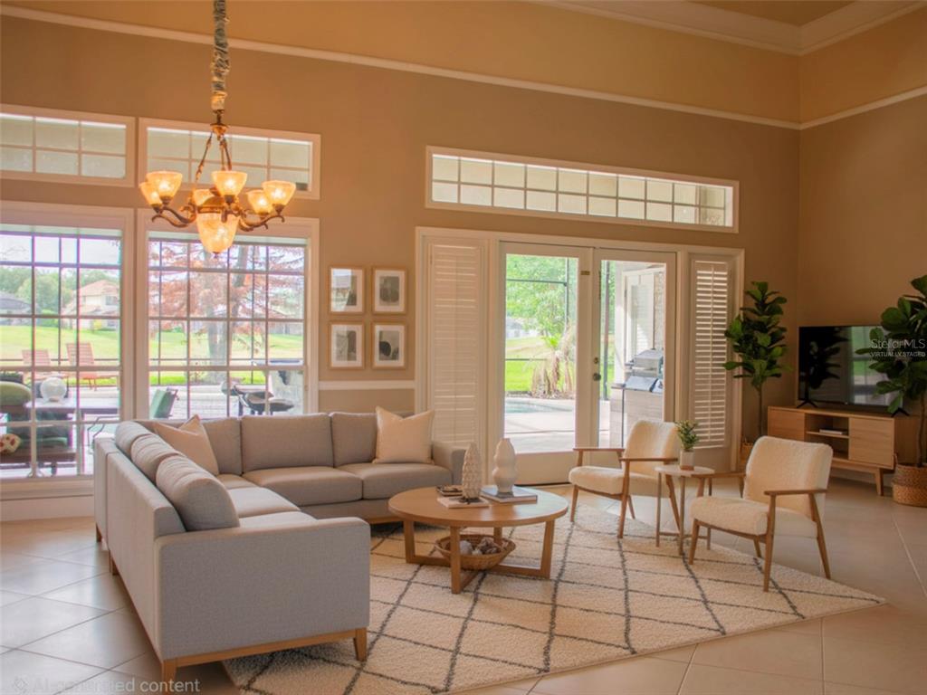 A living room features a sectional sofa, two armchairs, a coffee table, and large windows — 600 CHOCKTAW STREET, LAKE MARY, FL