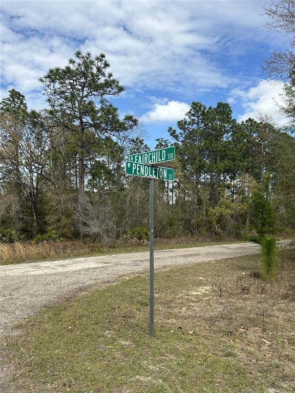 A street sign at the intersection of N Fairchild Ter and W Pendleton St — 1639 W PENDLETON STREET, DUNNELLON, FL