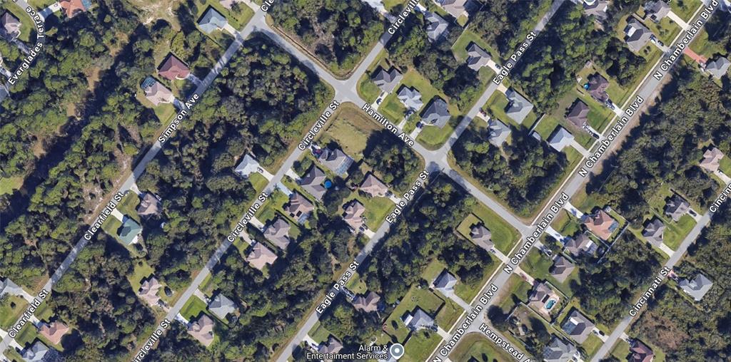 This is an aerial map view of a residential neighborhood with houses, streets, and trees — LOT 2 CIRCLEVILLE STREET, NORTH PORT, FL