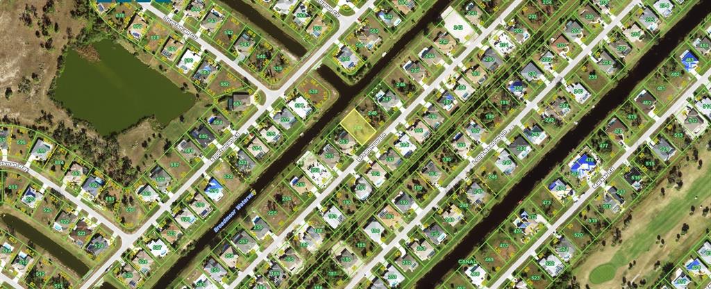 This is an aerial map view of a residential neighborhood with houses and canals — 238 BROADMOOR LANE, ROTONDA WEST, FL