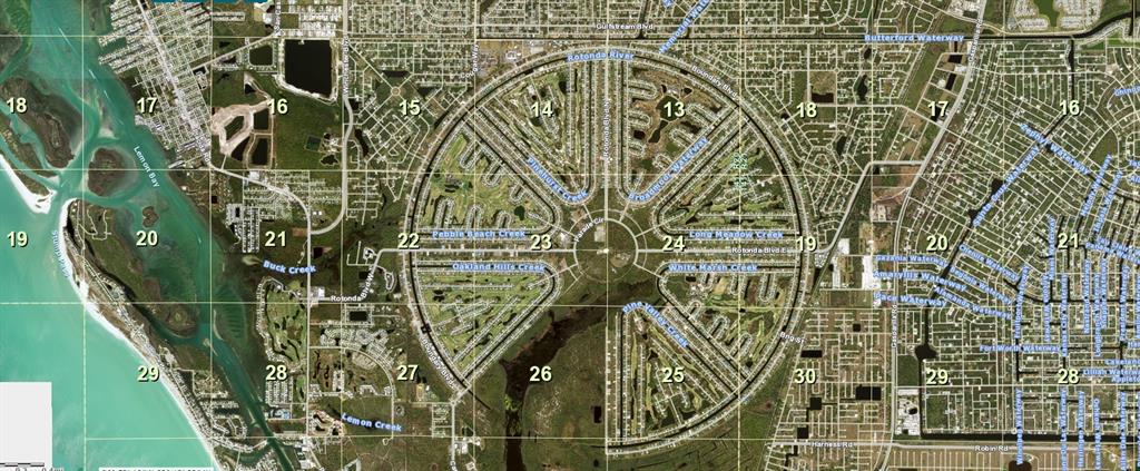 This is an aerial map showing a circular residential development with radiating streets and waterways — 238 BROADMOOR LANE, ROTONDA WEST, FL
