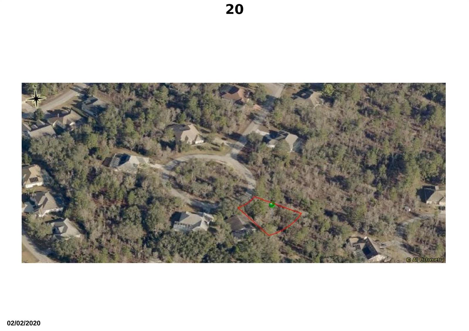 This aerial map shows a vacant, wooded residential lot outlined in red within a neighborhood — 20 Dahlia Court S, FL 34446, FL