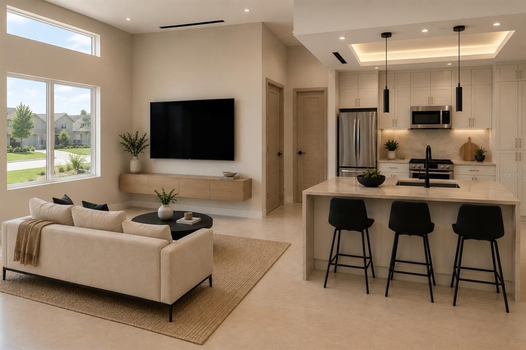An open-concept living room and kitchen featuring light wood cabinetry, a stone island, and neutral furniture — 14847 SW 29TH AVENUE ROAD, OCALA, FL