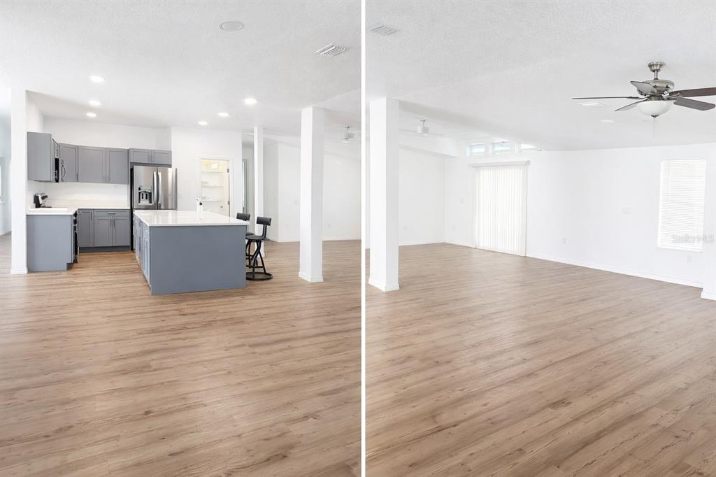 A split-view image showing a kitchen with gray cabinets and a spacious living area — 10121 EVANSTON LANE, WESLEY CHAPEL, FL
