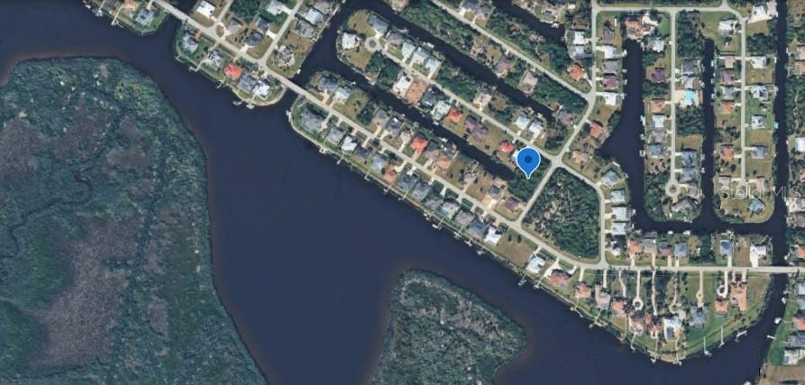 This is an aerial map view of a residential neighborhood with waterfront homes and canals — 4507 JOSEPH STREET, PORT CHARLOTTE, FL