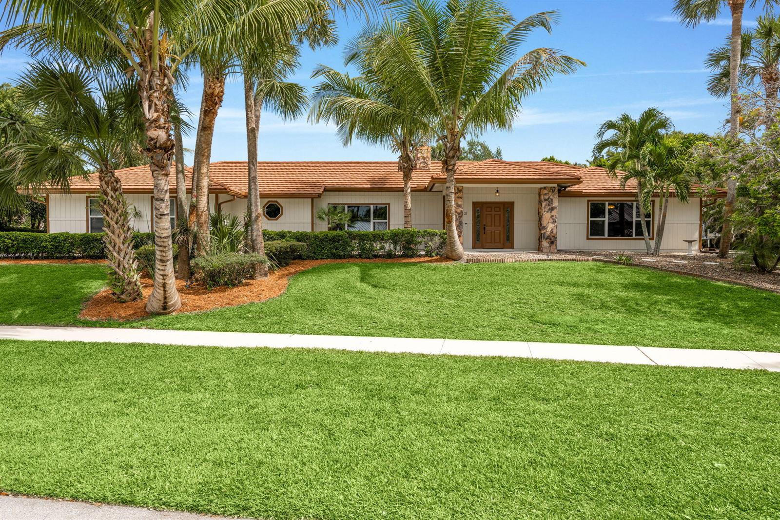 21 Whispering Oaks Circle, West Palm Beach FL 33411