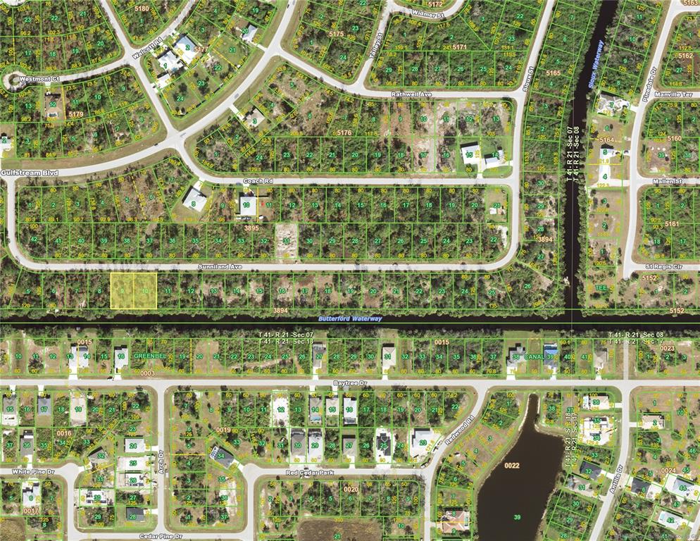 This is an aerial map showing residential lots, streets, and waterways in a neighborhood — 12395 SUNNILAND AVENUE, PORT CHARLOTTE, FL