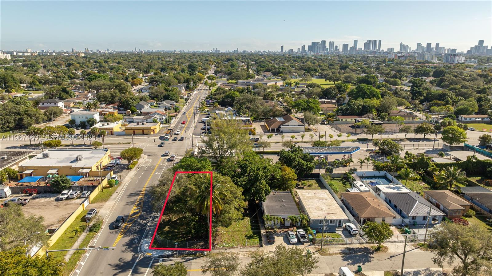 An aerial view shows a vacant, rectangular lot outlined in red next to a road — 2226 NW 46th St, Miami FL 33142, MIAMI, FL