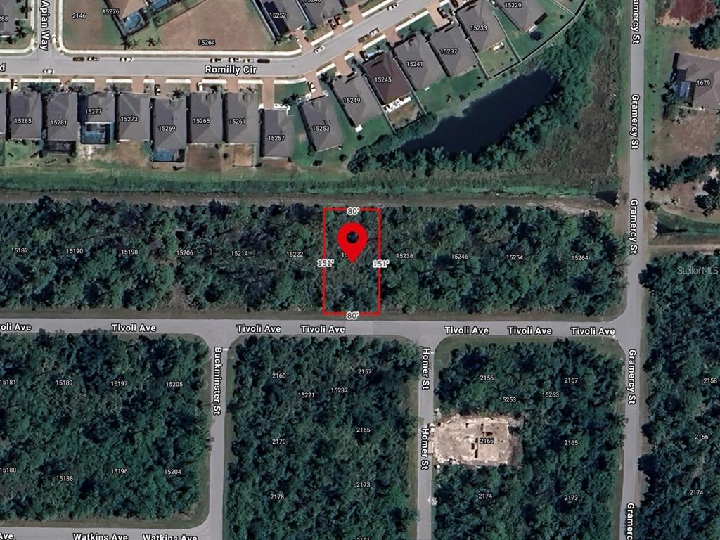 This is an aerial map showing a rectangular plot of land highlighted with a red marker — 15230 TIVOLI AVENUE, PORT CHARLOTTE, FL