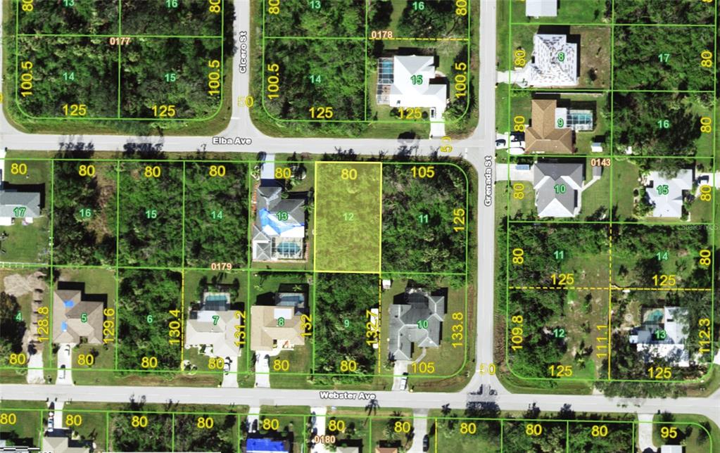 This is a satellite map showing residential lots and street layouts in a neighborhood — 943 ELBA AVENUE NW, PORT CHARLOTTE, FL