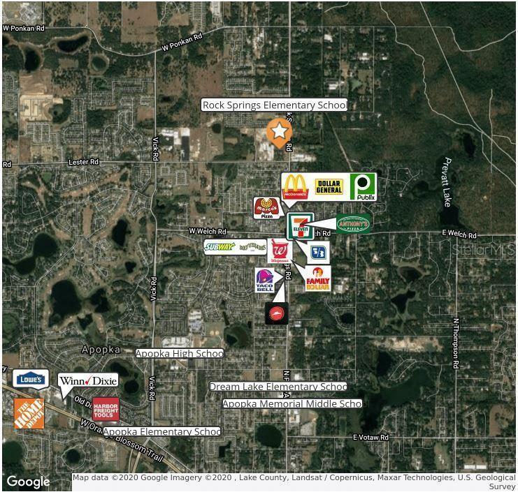 An aerial map view showing a highlighted vacant lot near Rock Springs Road — 2104 ROCK SPRINGS ROAD, APOPKA, FL