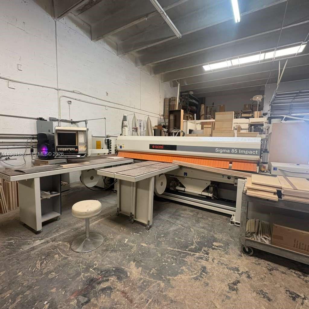 A large industrial SCM Sigma 85 Impact panel saw sits in a woodworking workshop — 2683 76, Hialeah FL 33016, HIALEAH, FL