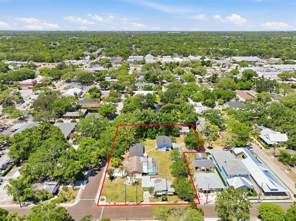 An aerial view shows a residential lot with multiple buildings outlined in red — 2ND STREET N, SAFETY HARBOR, FL