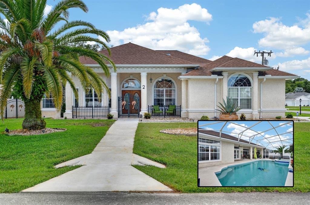 A single-story house with a palm tree, arched windows, and an inset photo of a pool — 2 FORGE LANE, PALM COAST, FL