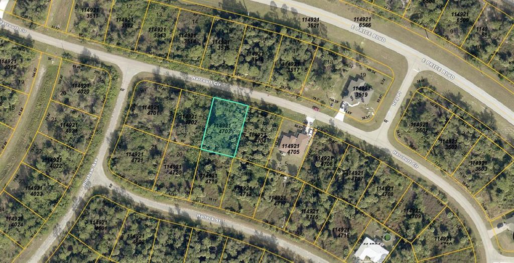 This is an aerial map showing a vacant residential lot highlighted in blue — 1149214703 HARCOURT CIRCLE, NORTH PORT, FL