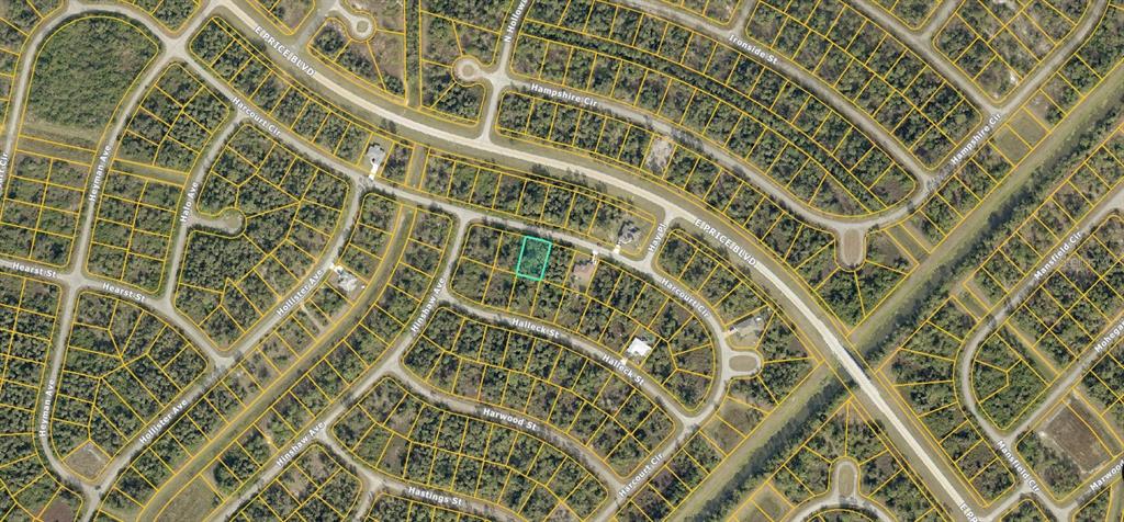 This is an aerial map showing a highlighted vacant residential lot in a suburban neighborhood — 1149214703 HARCOURT CIRCLE, NORTH PORT, FL