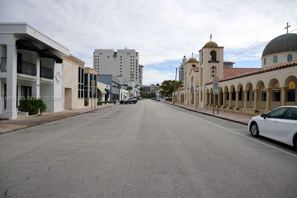 A street view shows a white building on the left and a church on the right — 355 Palermo Ave, Coral Gables FL 33134, CORAL GABLES, FL