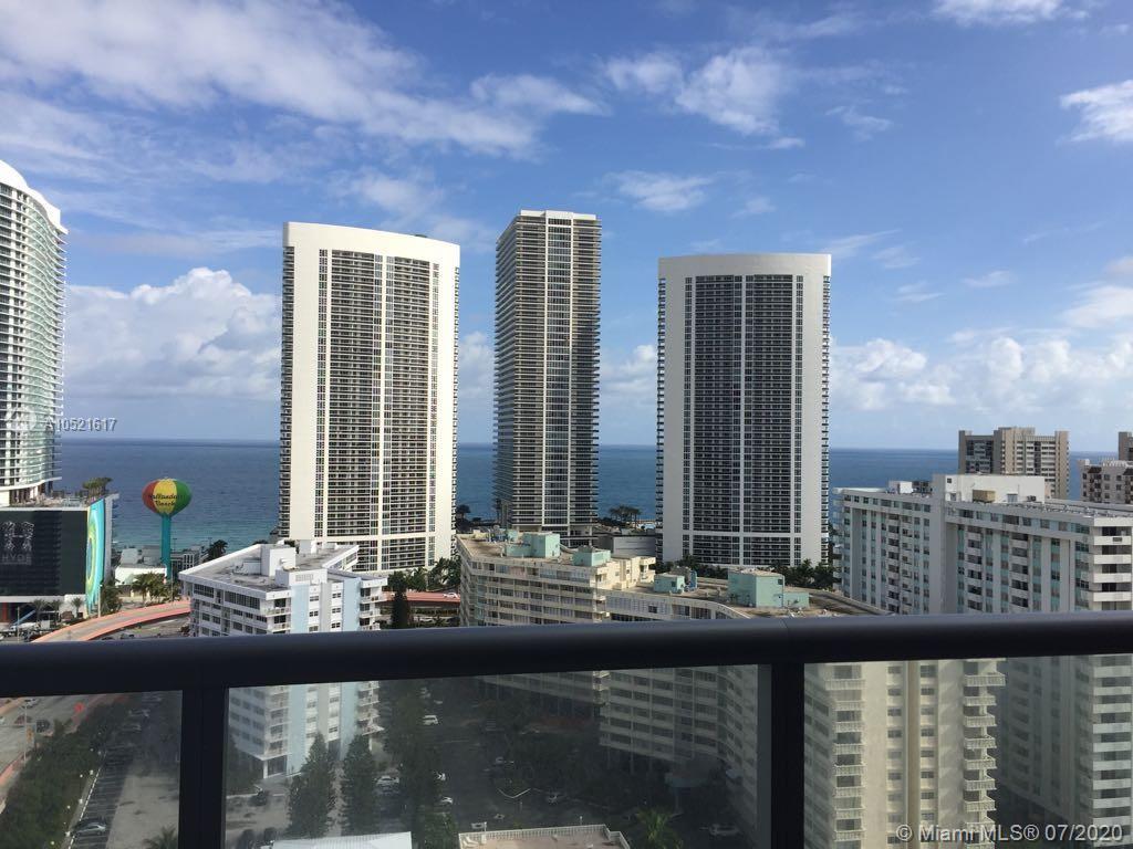 An elevated view of several tall residential towers overlooking the ocean and beach — 2600 E Hallandale Beach # 2202, Hallandale Beach FL 33009, HALLANDALE BEACH, FL
