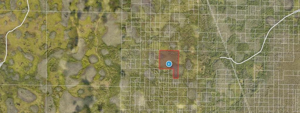An aerial map shows a highlighted rectangular property parcel surrounded by a grid of lots — WATER ROAD, GROVELAND, FL