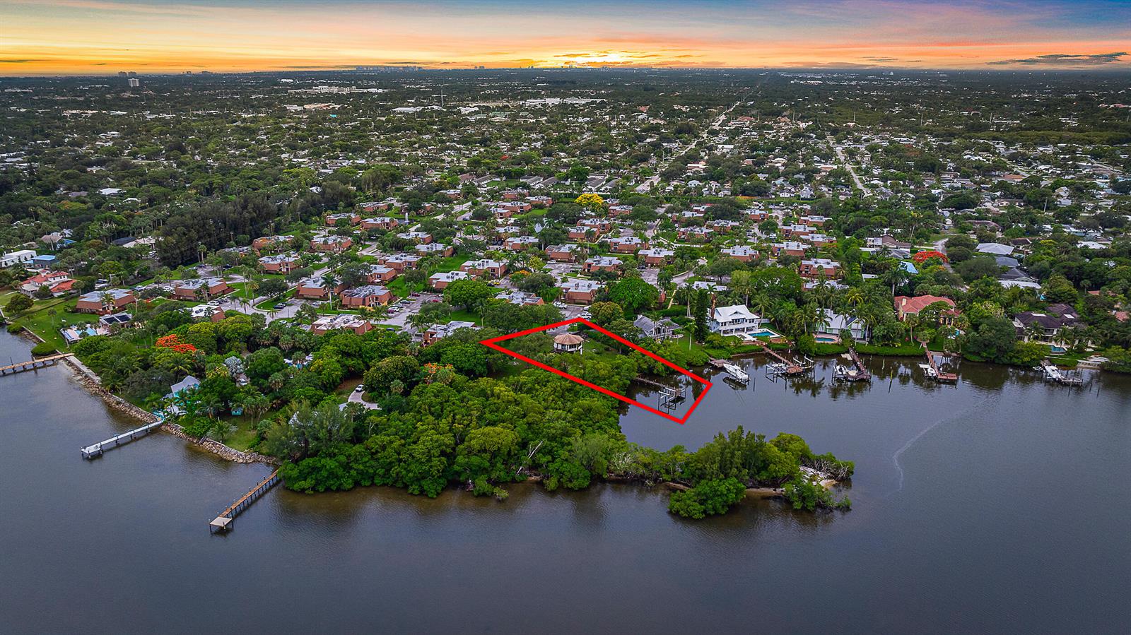 An aerial view shows a waterfront lot with a gazebo, highlighted by a red outline — 18189 49th Terrace, Jupiter FL 33458, JUPITER, FL