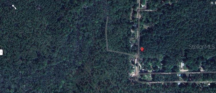 This is an aerial map view of a wooded lot located near a residential road — 17847 LIL DIXIE DRIVE, SANDERSON, FL
