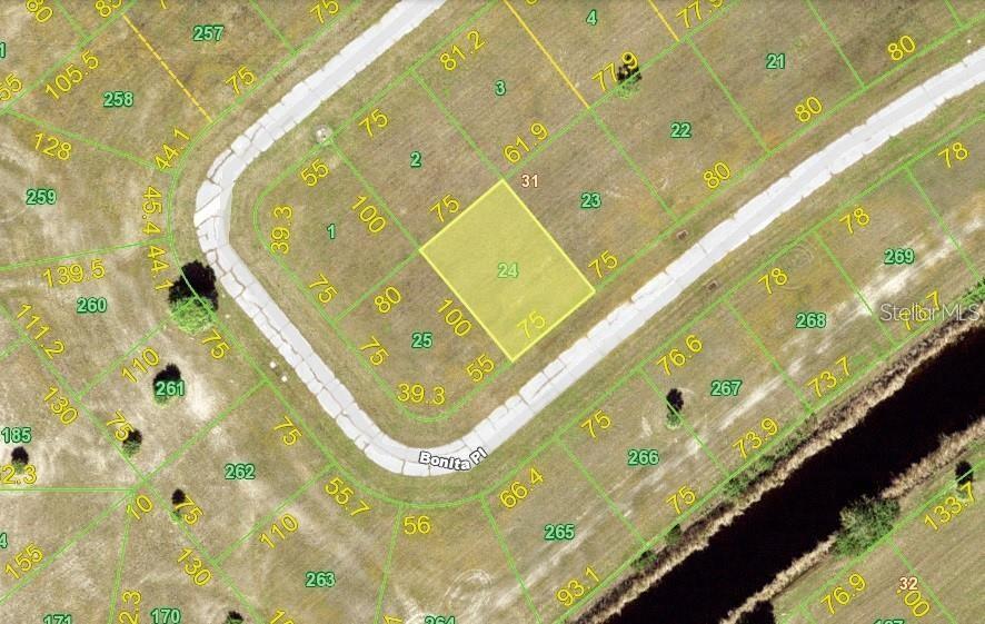 This is an aerial map showing a highlighted vacant residential lot in a subdivision — 12319 BONITA PLACE, PLACIDA, FL