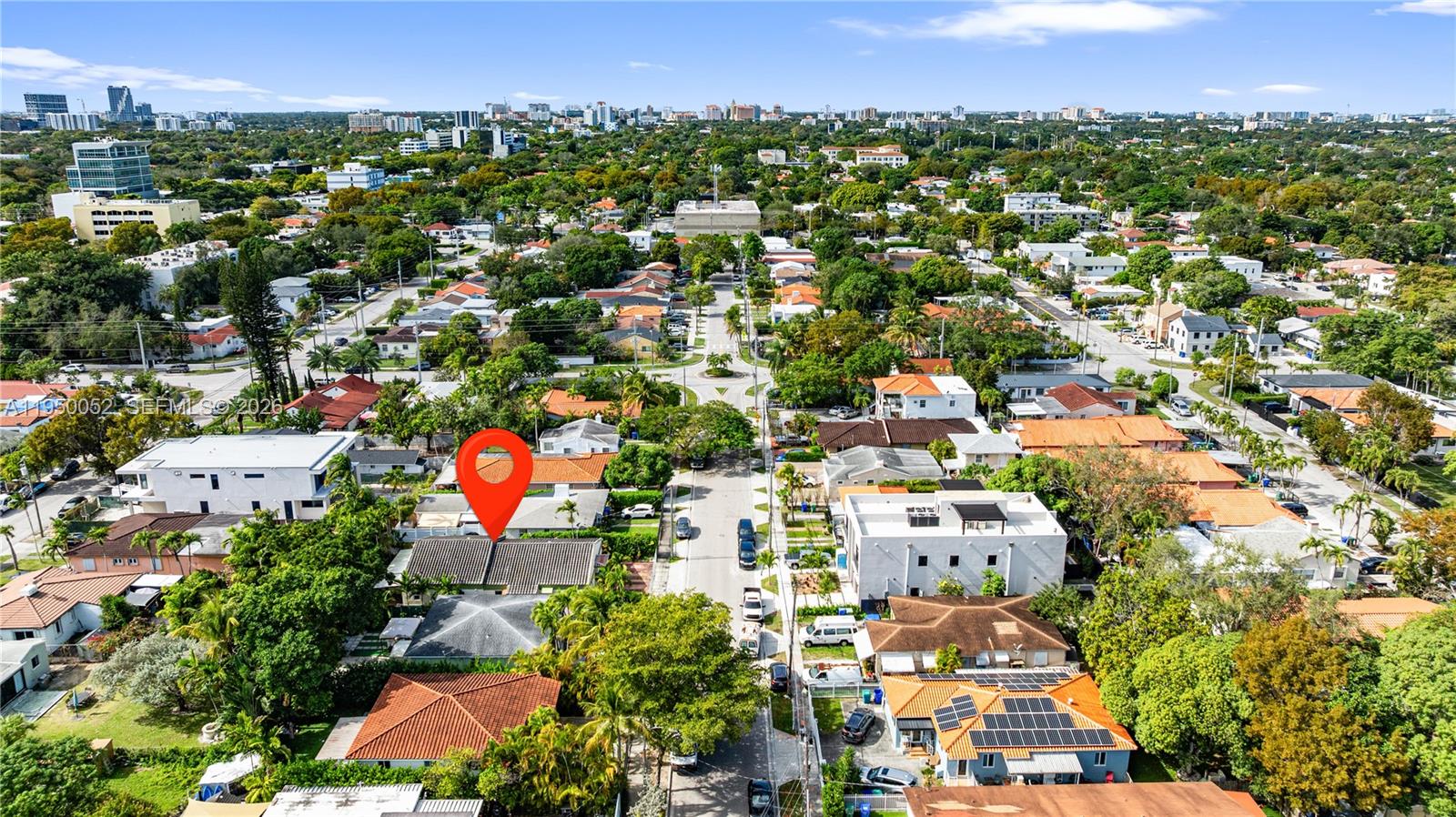 An aerial view shows a residential neighborhood with a red location pin marking a house — 1428 SW 20th St, Miami FL 33145, MIAMI, FL