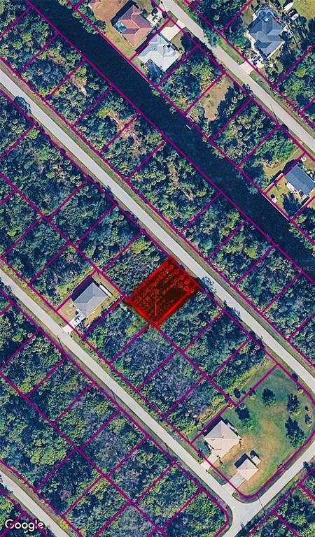 This is an aerial map showing a highlighted vacant lot in a residential neighborhood — 515 MCDRILL DRIVE, PORT CHARLOTTE, FL