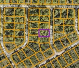 An aerial map view shows a rectangular lot highlighted in purple within a residential neighborhood — LOT 17 ALPACA STREET, NORTH PORT, FL