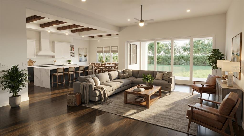This rendering shows an open-concept living room and kitchen with wood floors and ceiling beams — 142 TRANQUIL MIRROR LAKE COURT Lot 18, CLERMONT, FL