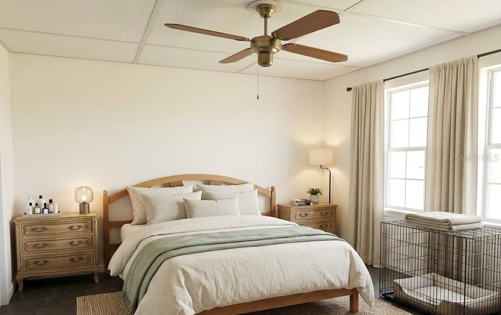 A bedroom features a wooden bed, two nightstands, a ceiling fan, and a dog crate — 1221 SE 24TH ROAD, OCALA, FL