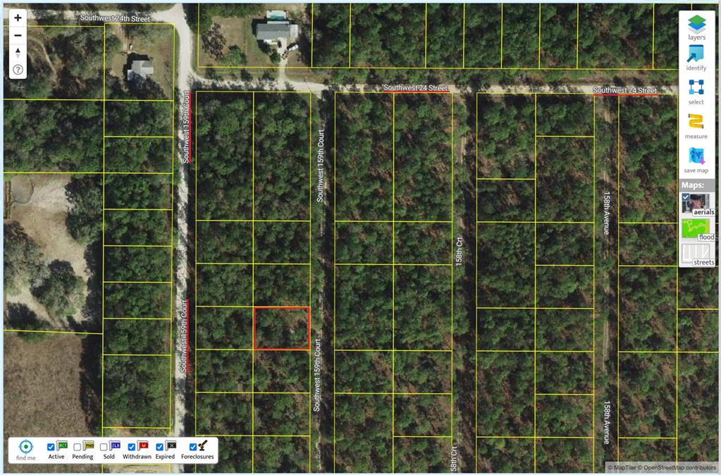 This is a satellite map view showing a highlighted rectangular plot of land among trees — 0 SW 159TH CT  &, OCALA, FL