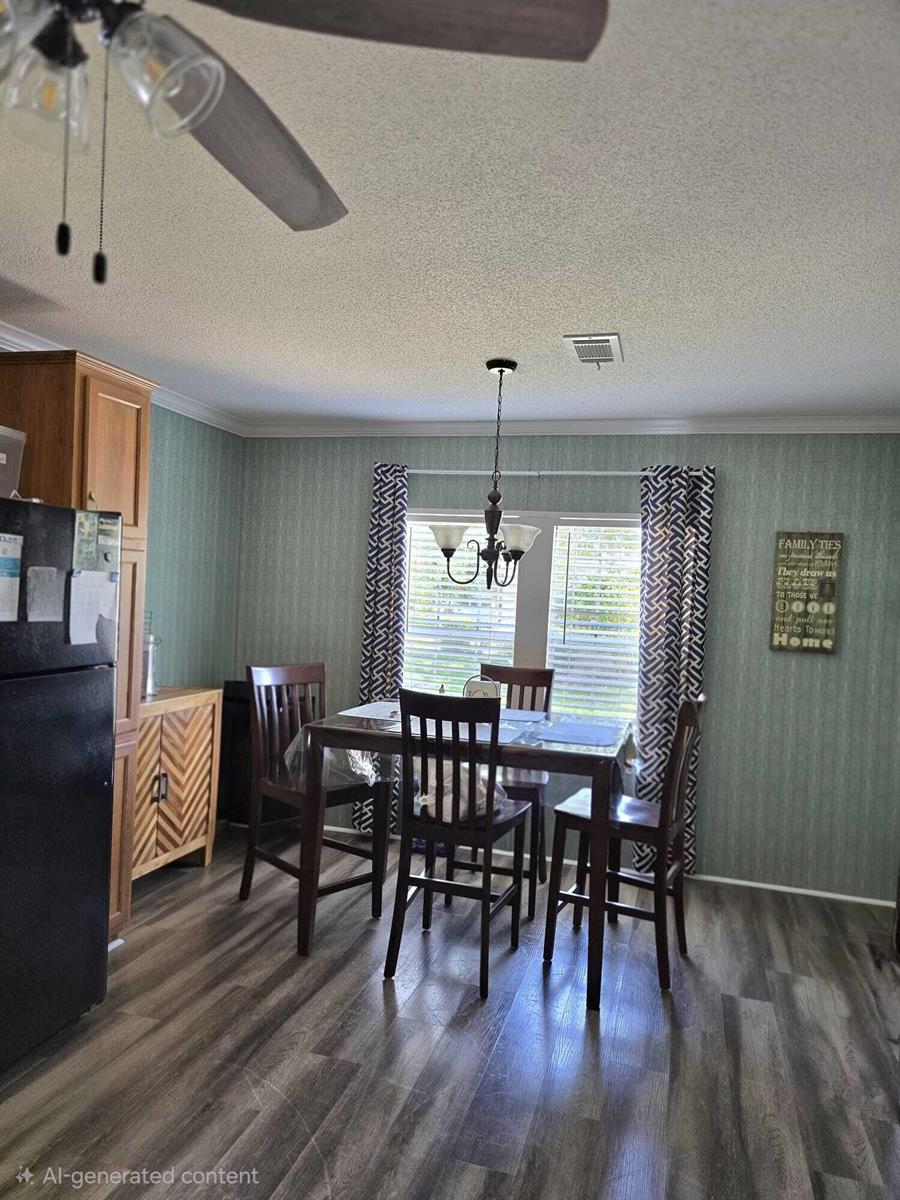 A dining area features a dark wood table and chairs, patterned curtains, and green wallpaper — 5003 NW 4 Terrace, Deerfield Beach FL 33064, DEERFIELD BEACH, FL