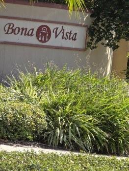 A sign for Bona Vista stands behind a large patch of green ornamental grass — 831 CAMARGO WAY UNIT 109, ALTAMONTE SPRINGS, FL