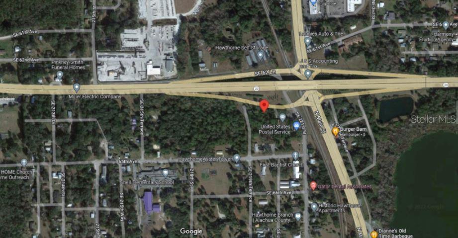 This is a satellite map view of a wooded area near a highway intersection — SE HAWTHORNE RD, HAWTHORNE, FL