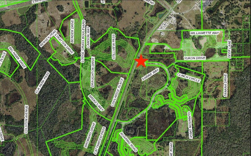 This is a map showing residential street layouts and property boundaries with a red star — 0 N GALL BOULEVARD UNIT 1.08 Acres, ZEPHYRHILLS, FL