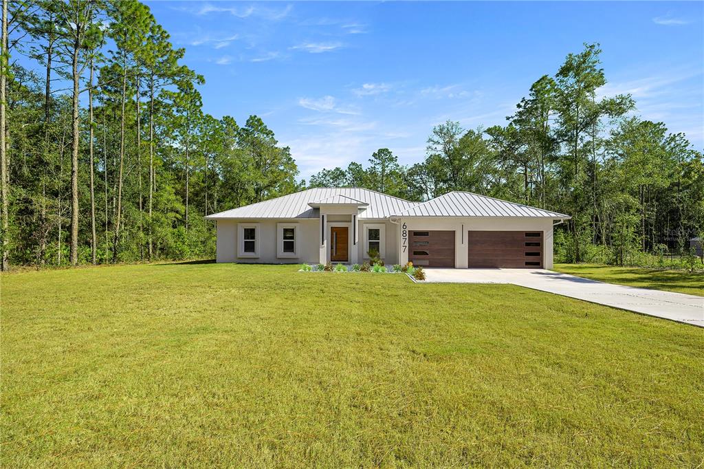 6877 SW 131ST CIRCLE, OCALA, FL — photo 2 of 30