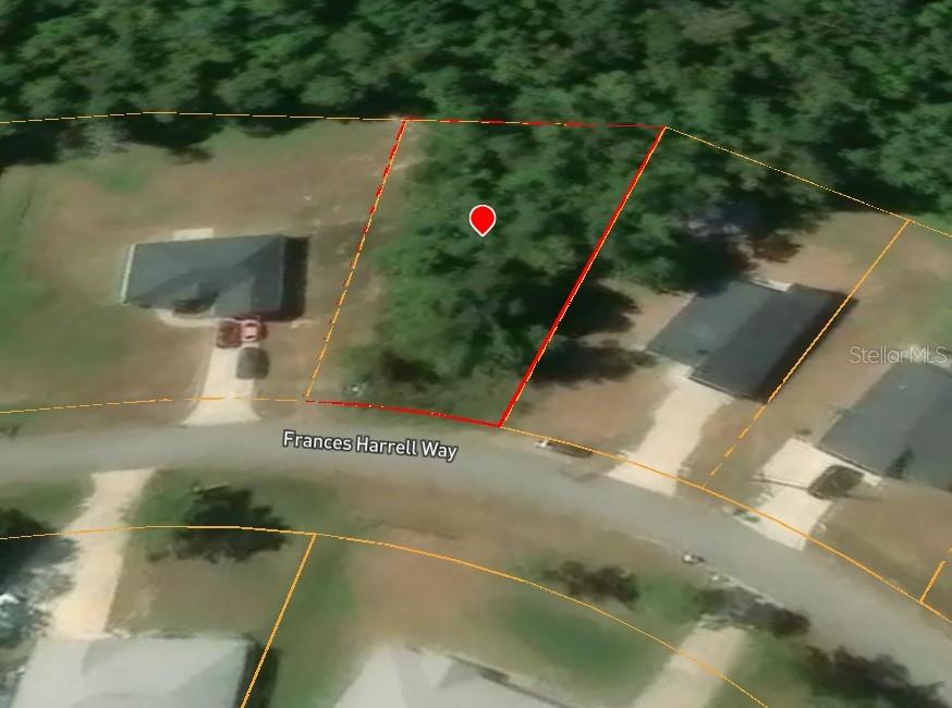 This is an aerial map view of a vacant, wooded residential lot — 119 FRANCIS HARRELL WAY, MIDWAY, FL