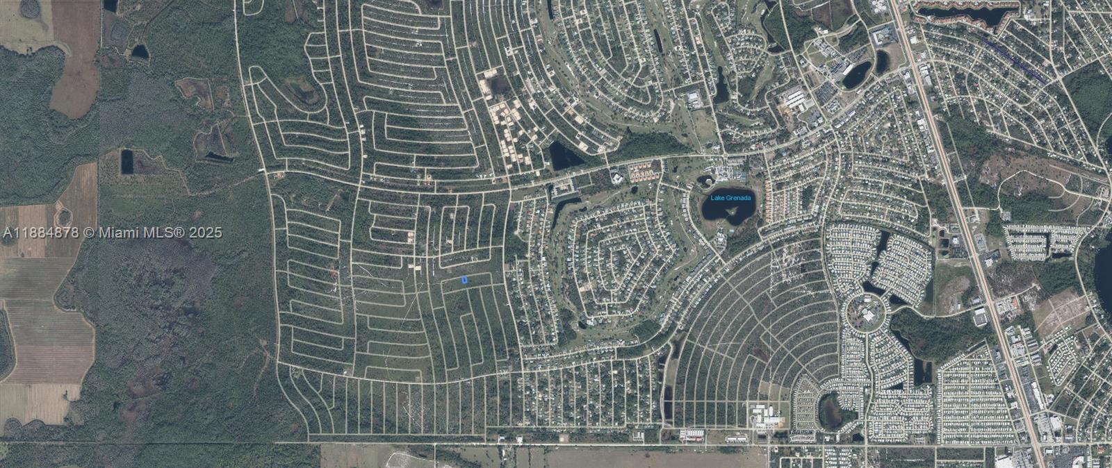 This is an aerial map view of a residential neighborhood with a lake — 5008 Corsica Drive, Sebring FL 33872, SEBRING, FL