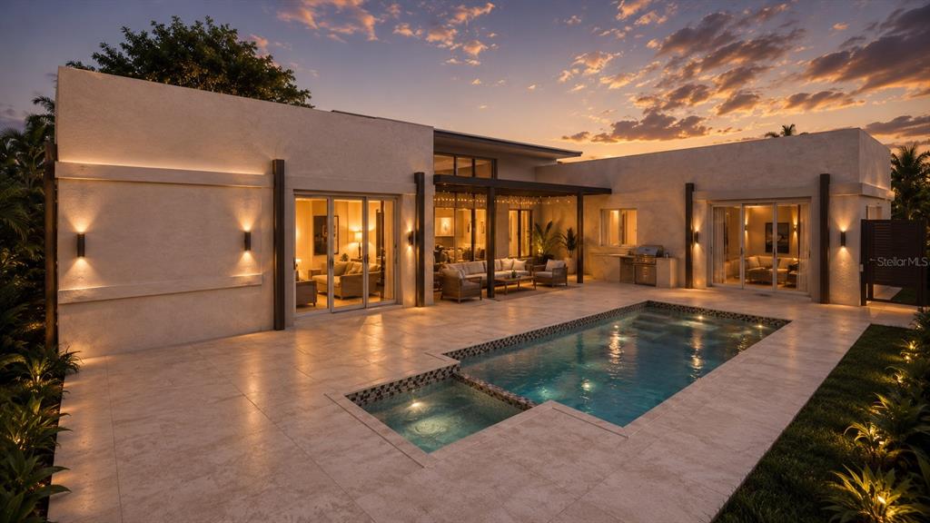 A modern house exterior features a patio, swimming pool, and outdoor lighting at sunset — 440 S LIME AVENUE, SARASOTA, FL