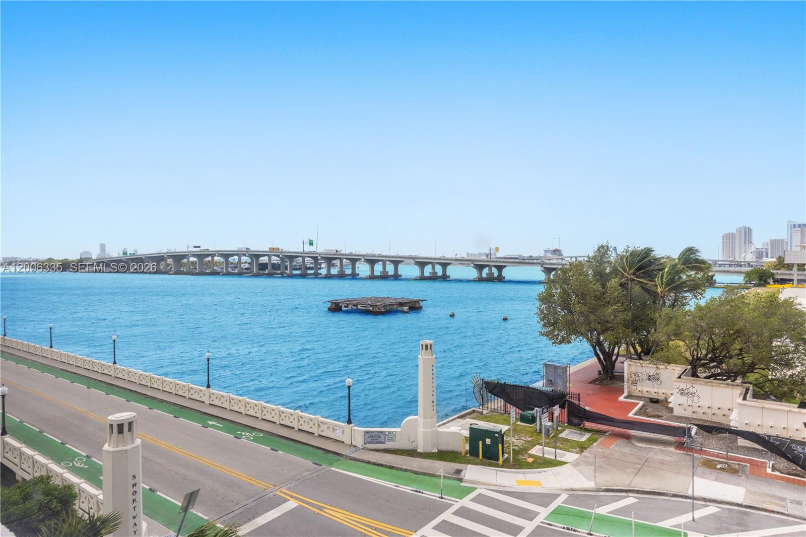 An elevated view of a coastal road, a bridge, and a body of water — 555 NE 15th St # 501, Miami FL 33132, MIAMI, FL