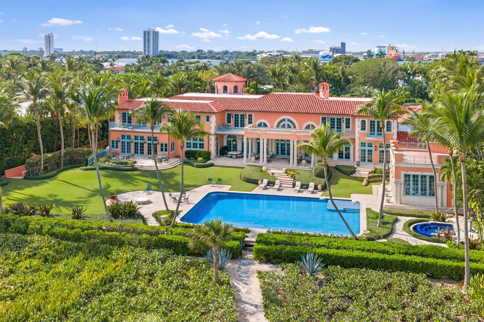 An aerial view of a large Mediterranean-style mansion with a pool and landscaped backyard — 1491 N Ocean Boulevard, Palm Beach FL 33480, PALM BEACH, FL