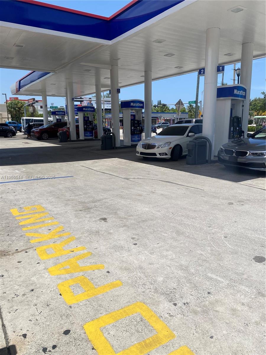 A Marathon gas station features multiple fuel pumps under a large white canopy — 5390 NE 2nd Ave, Miami FL 33137, MIAMI, FL