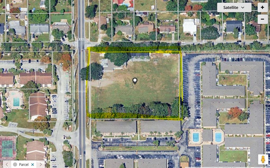 This is a satellite map view of a rectangular parcel of land with trees — 5721 S TEXAS AVENUE, ORLANDO, FL
