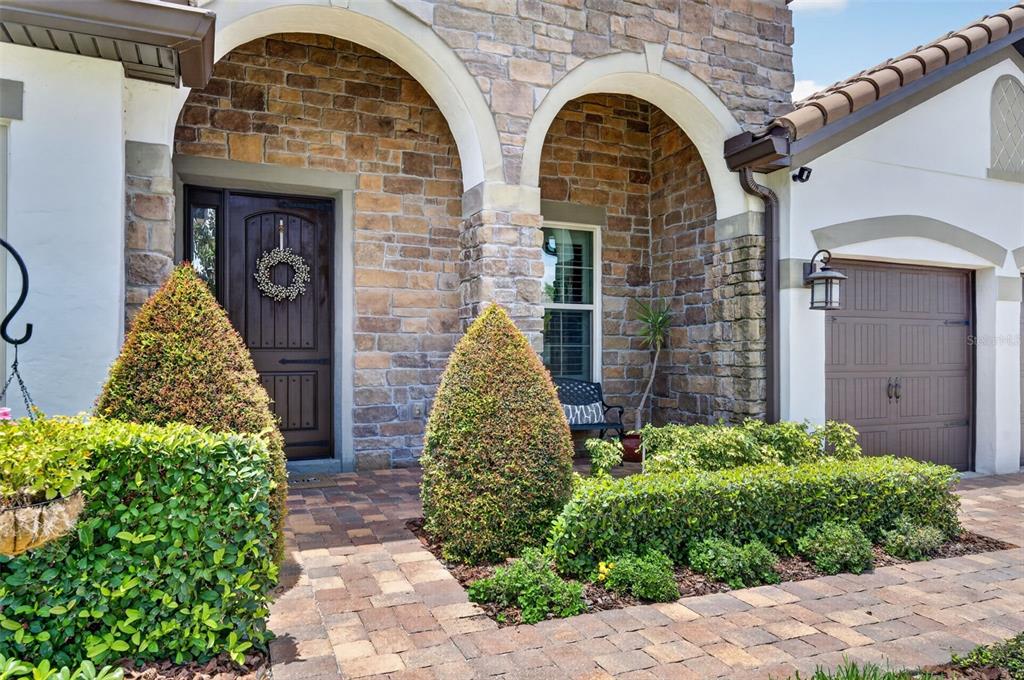 This is a floor plan of a single-story house with a garage and multiple bedrooms — 1492 VIA SANGRO PL, WINTER PARK, FL