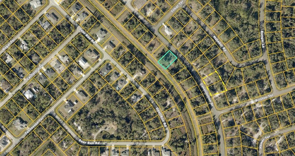 This is an aerial map view of a residential lot highlighted in a light blue box — Lot 68 CONSTITUTION DRIVE, NORTH PORT, FL
